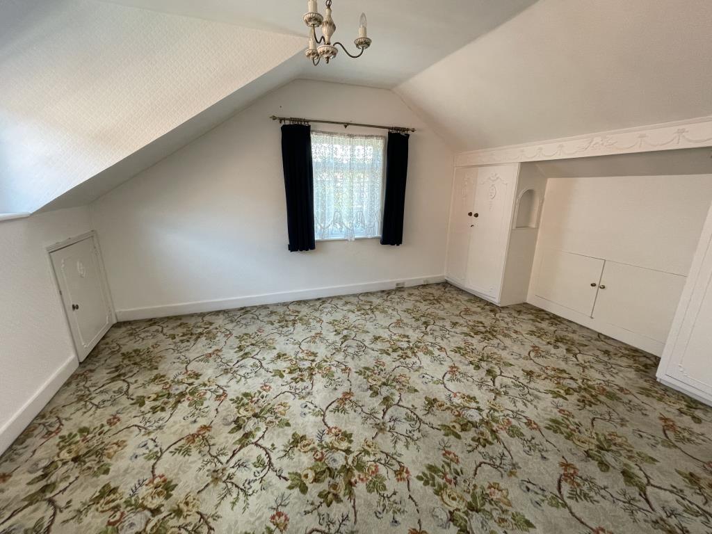 Lot: 84 - DETACHED BUNGALOW & GARAGE WITH POTENTIAL - inside image of bedroom from landing